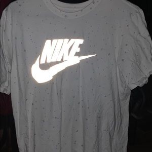 Nike shirt with flash light sensitive swoosh
